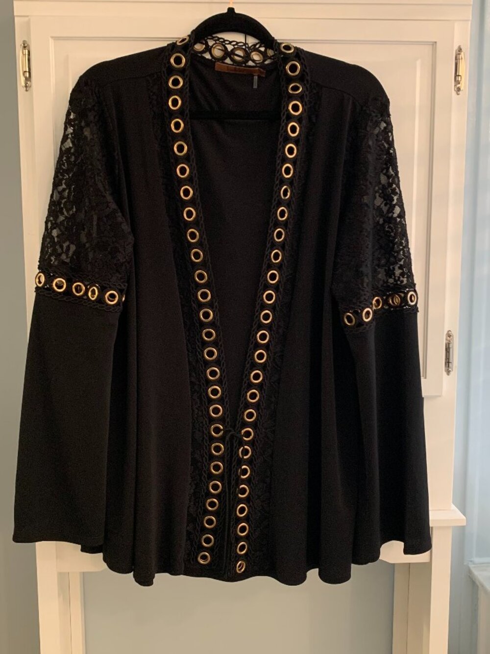Black open-front black knit cardigan by Belldini